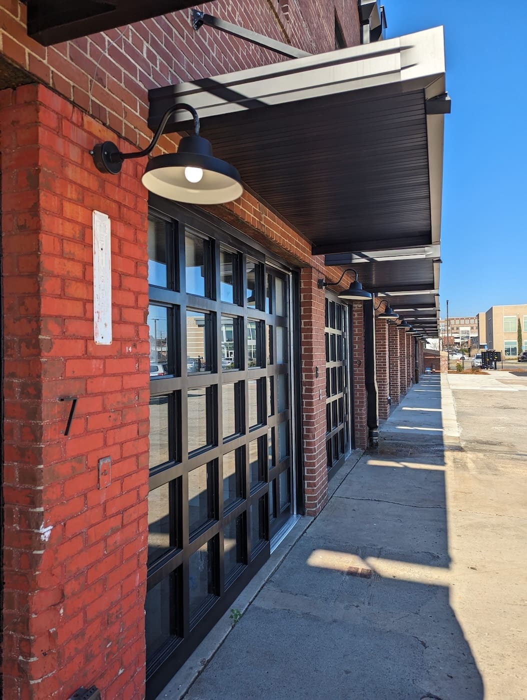 Door/window units shown in finished front elevation.