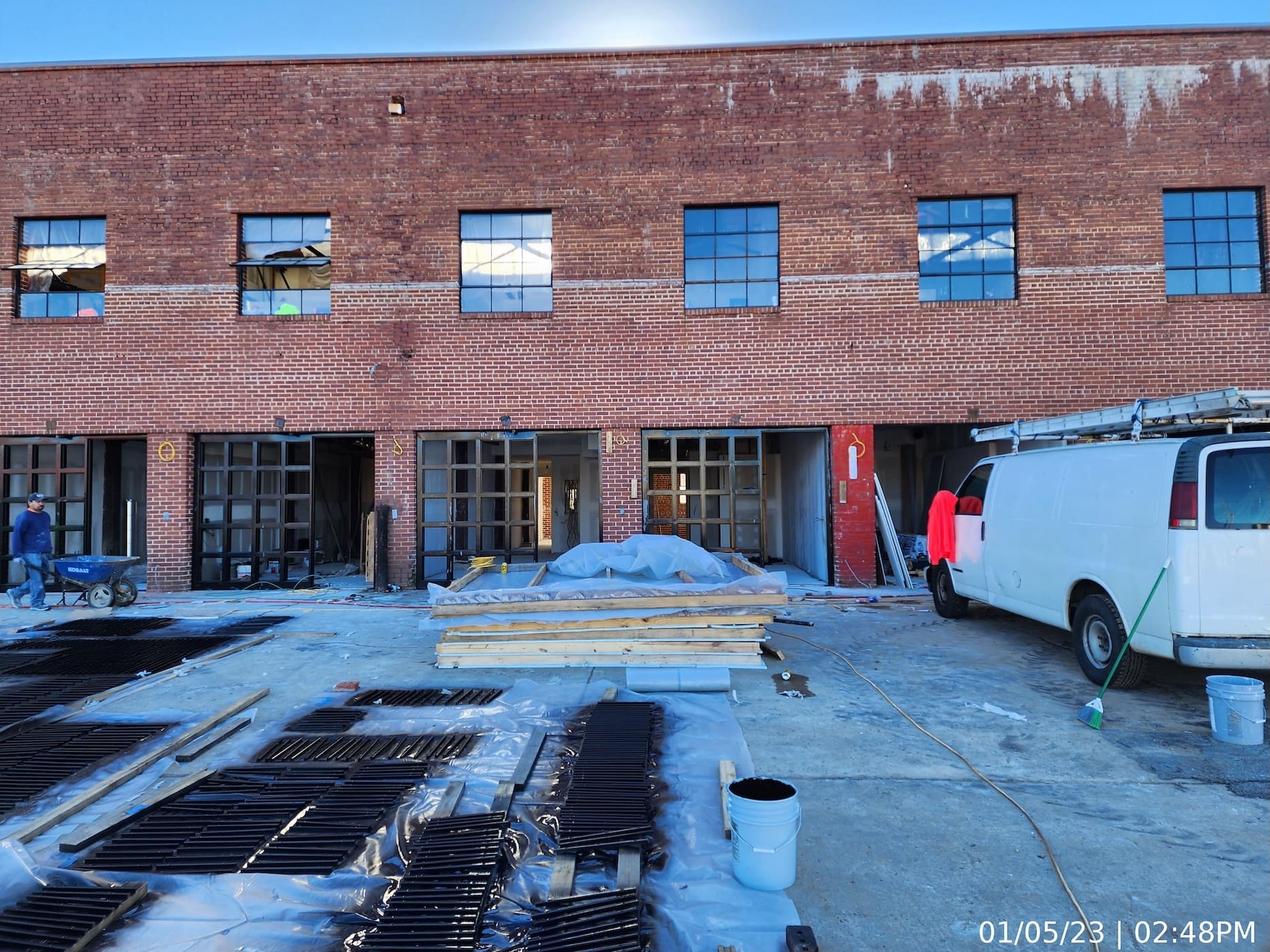Installation of door/window units in progress.