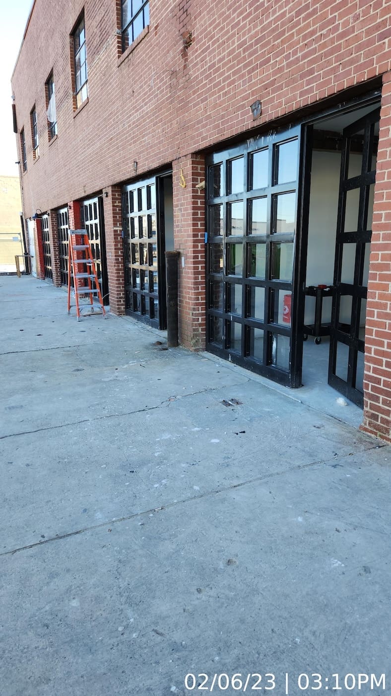 Door/window units installed and glazed.