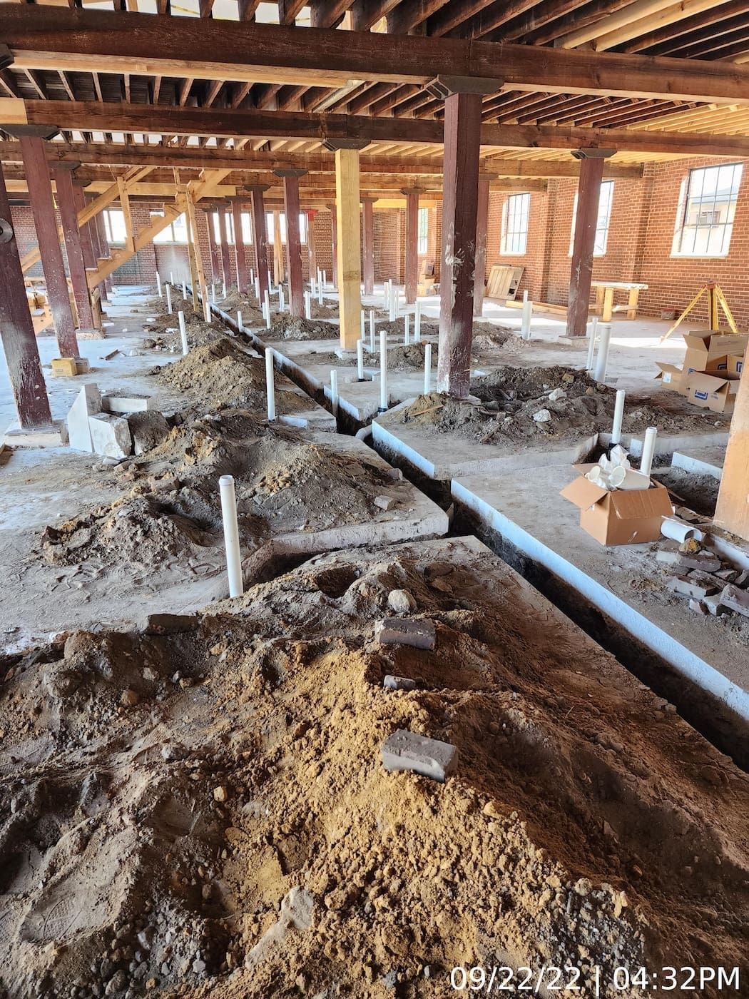 Lower level rough-in of plumbing waste lines.