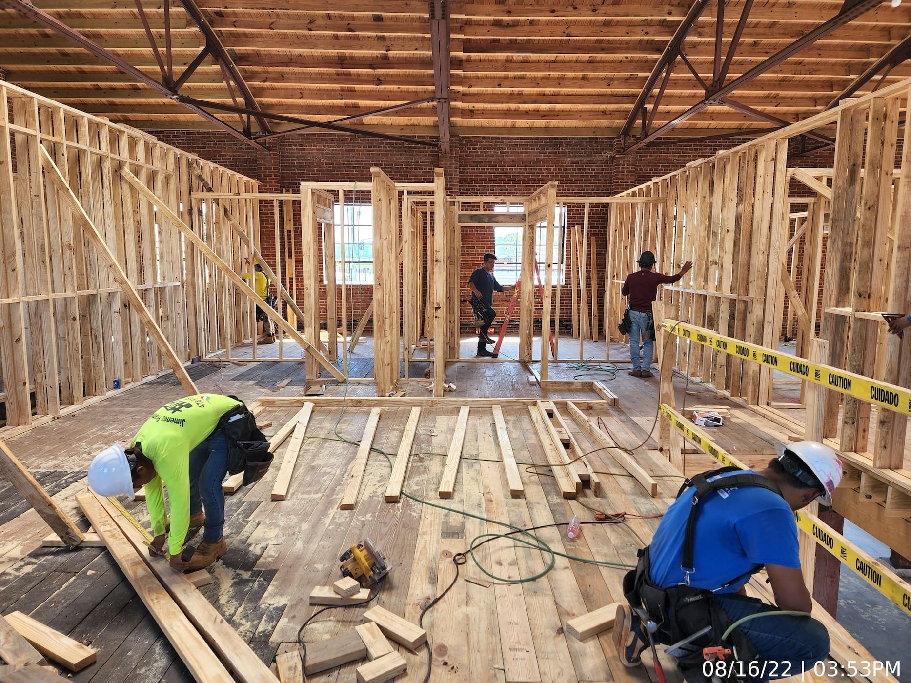 Upper level interior framing continues.